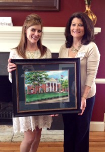 Andrea and I holding framed DSP artwork