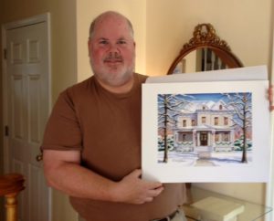 Oliver Chrisler holding portrait ( C) 2016 Richelle Flecke