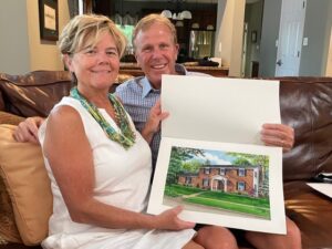 Happy recipients of a house portrait